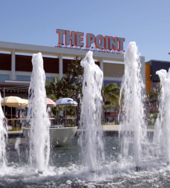 Exterior of The Point sign with water fountains
